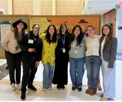 Lab members together at the Spooktacular Poster Night